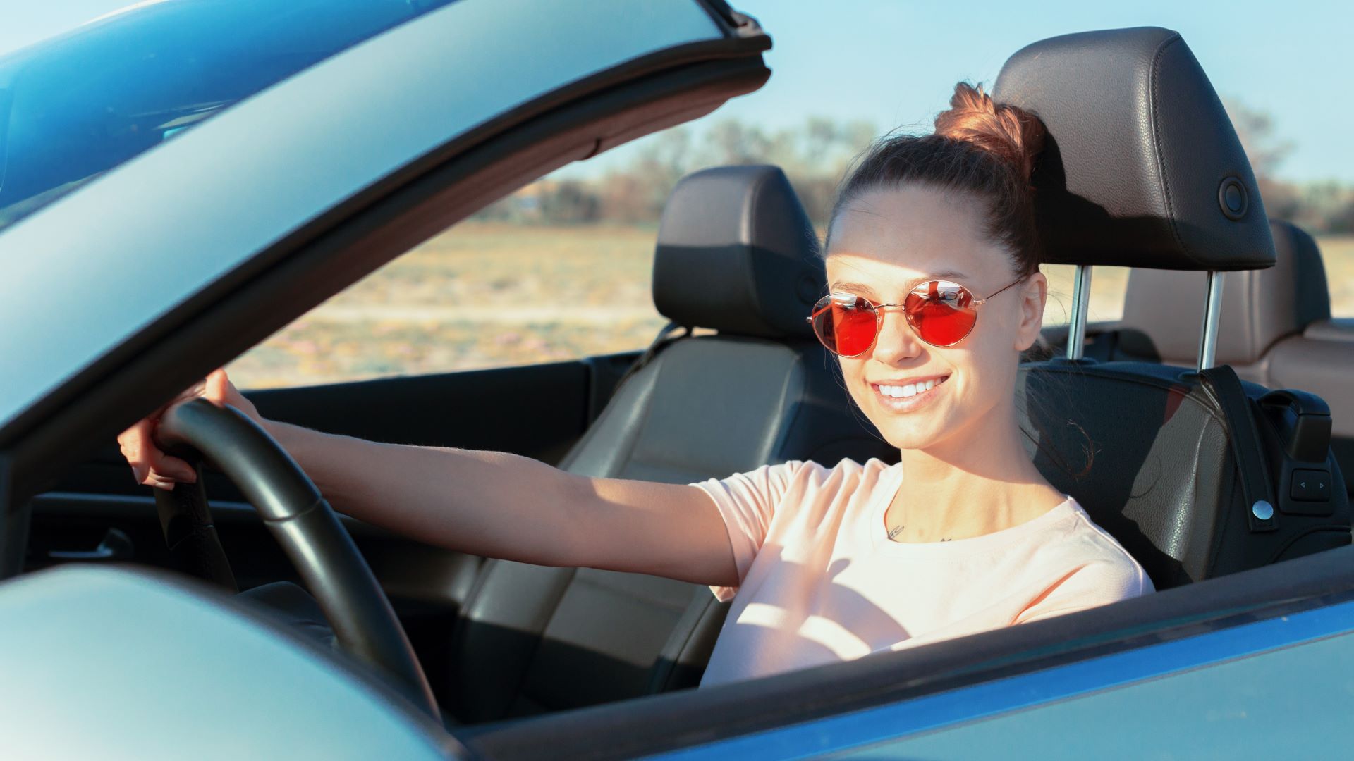 relaxed happy woman traveling car