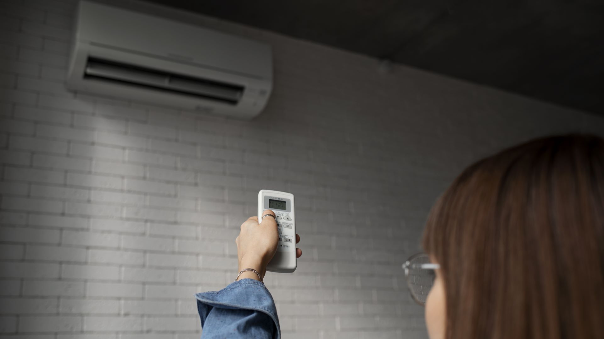 young woman using home technology
