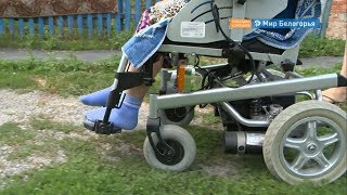 Коляска с электроприводом для нуждающейся 